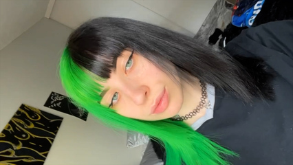black hair green bangs